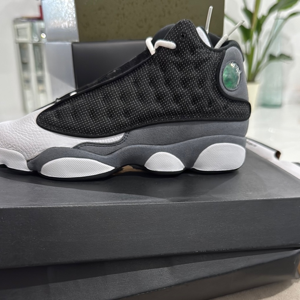 Air Jordan 13 Retro Black and White Sneakers